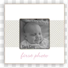 A baby first photo scrapbook frame featuring a newborn infant on a transparent background.