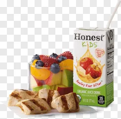 A healthy kids meal with grilled chicken nuggets, juice box, and fruit cup on a transparent background.