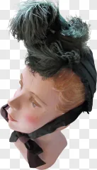 A vintage mannequin head wearing a black feathered hat on a transparent background.