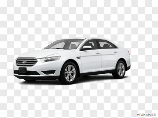 White Ford Taurus sedan vehicle displayed on a transparent background.
