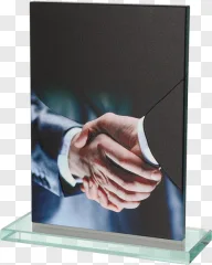 A clear acrylic display stand featuring a business handshake on a transparent background.