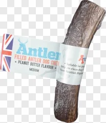 A medium-sized peanut butter filled antler dog chew on a transparent background.
