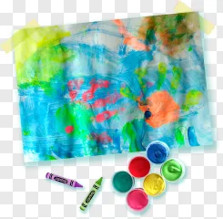 Childrens painted artwork with crayons and paintpots displayed on a transparent background.
