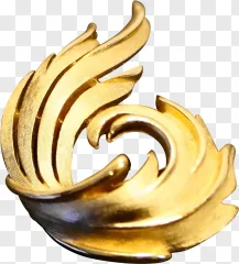 A golden leaf brooch with a swirling metallic design on a transparent background.
