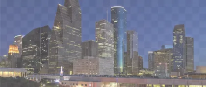 Houston skyline at night with illuminated skyscrapers shown on a transparent background.