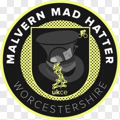 Malvern Mad Hatter Worcestershire cycling emblem showing a top hat and bicycle chain on a transparent background.