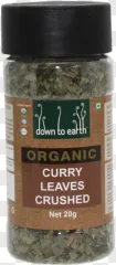 A plastic spice jar filled with crushed curry leaves on a transparent background.