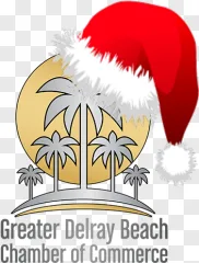 A Christmas Santa hat on palm trees on a transparent background.