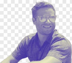 Smiling man with glasses and beard on a transparent background.