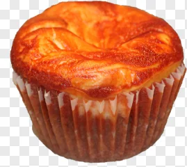 A delicious baked muffin in a paper liner shown on a transparent background.