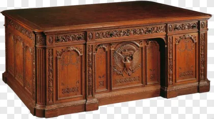 Ornate carved wooden executive office desk shown on a transparent background.